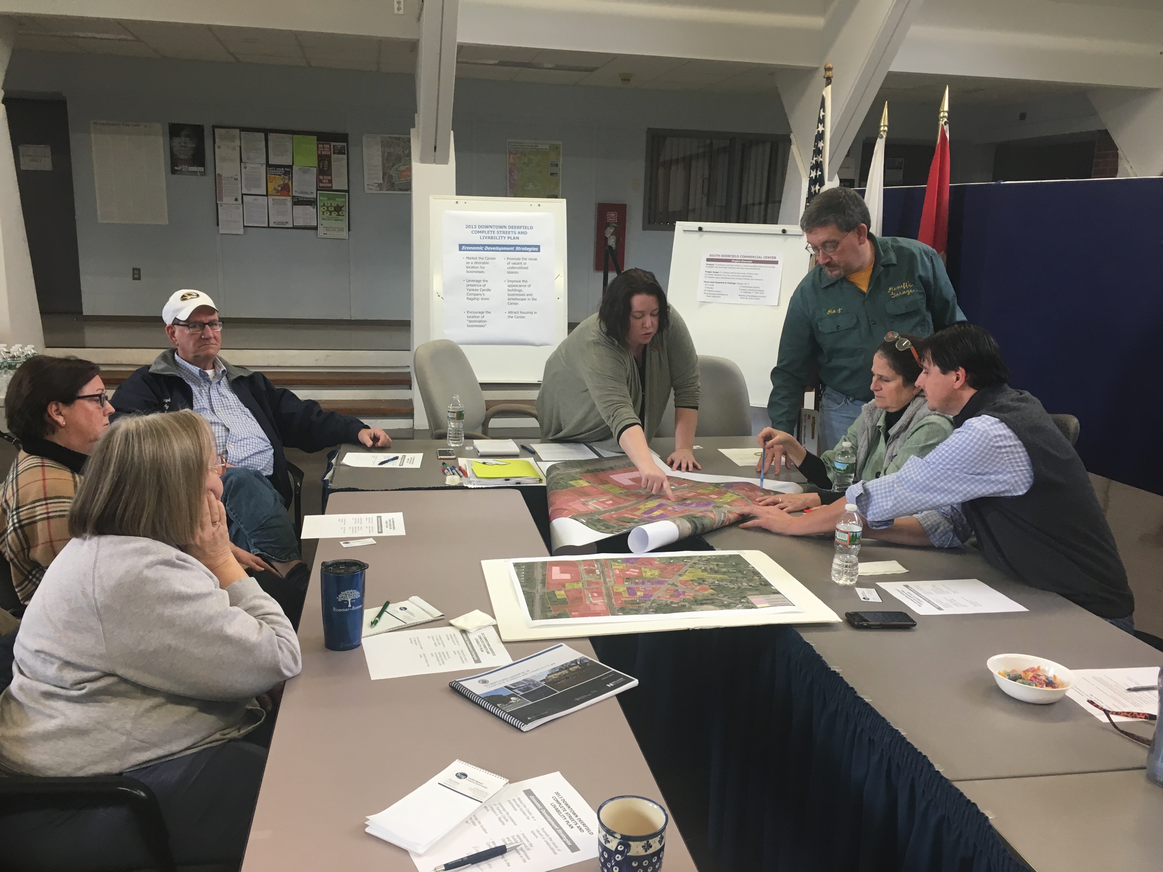 Local landlords and citizens share ideas at a recent meeting in Town Hall about how to improve South Deerfield. Max Hartshorne photo.