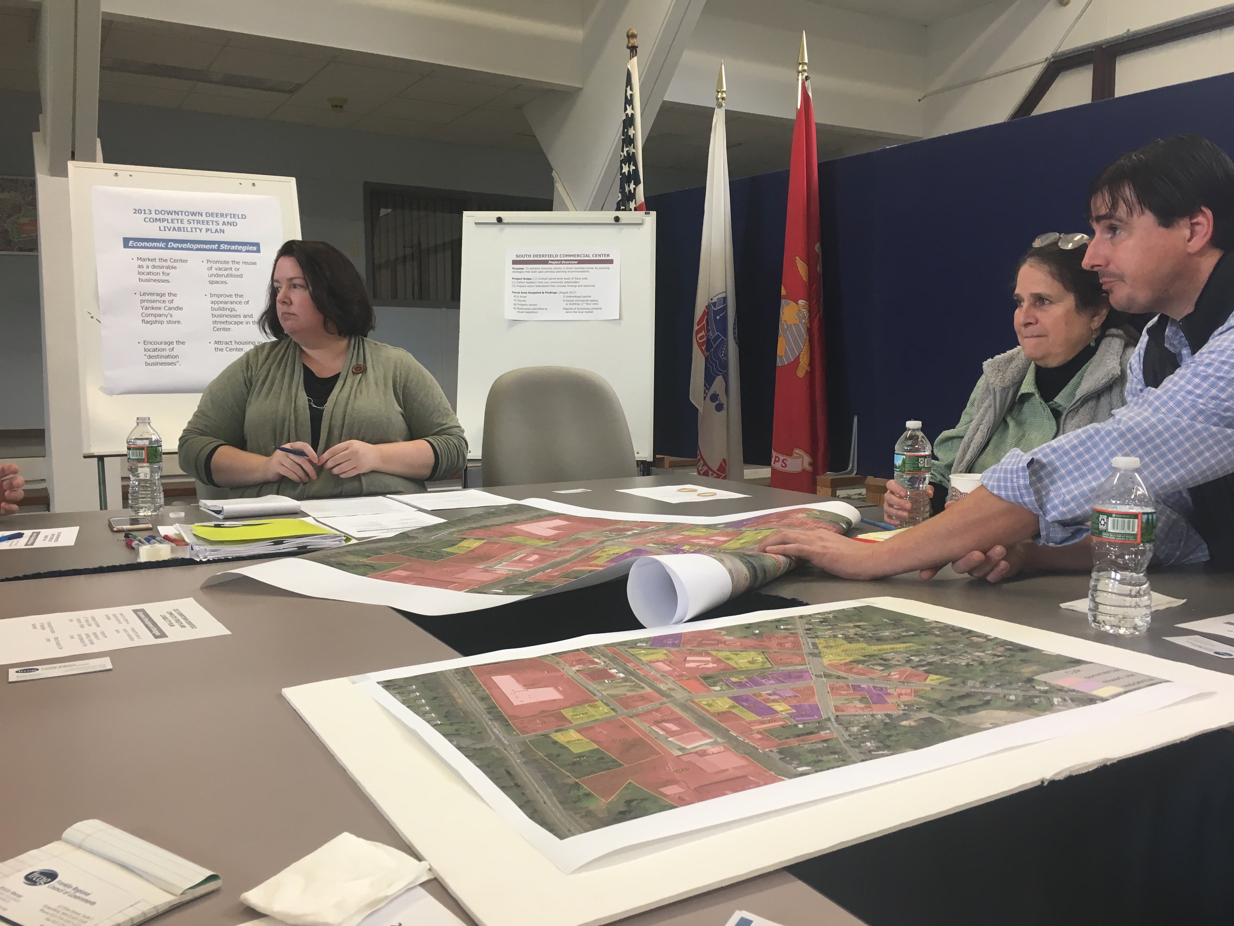 Jessica Atwood, from FRCOG, Wendy Foxmyn, Deerfield Town Administrator, and Selectboard member Trevor McDaniel join citizens discussing strategies to improve downtown South Deerfield at a meeting in Town Hall.